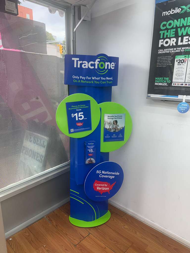 Tracfone stand by the store window