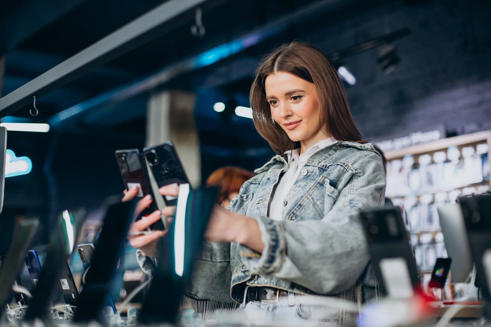 Customer choosing a phone in a wireless store